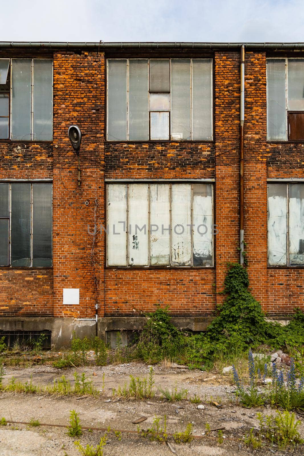 Outdoor view to square and old construction on old boiler building by Wierzchu