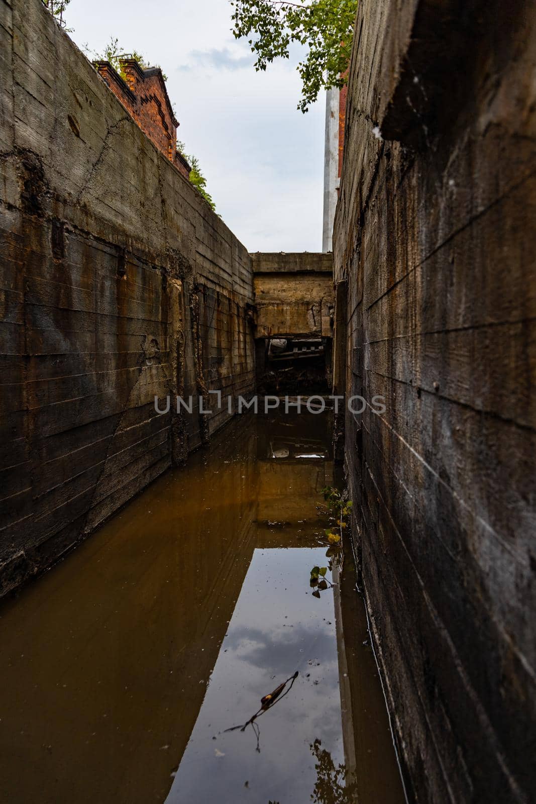 Outdoor view to square and old construction on old boiler building by Wierzchu