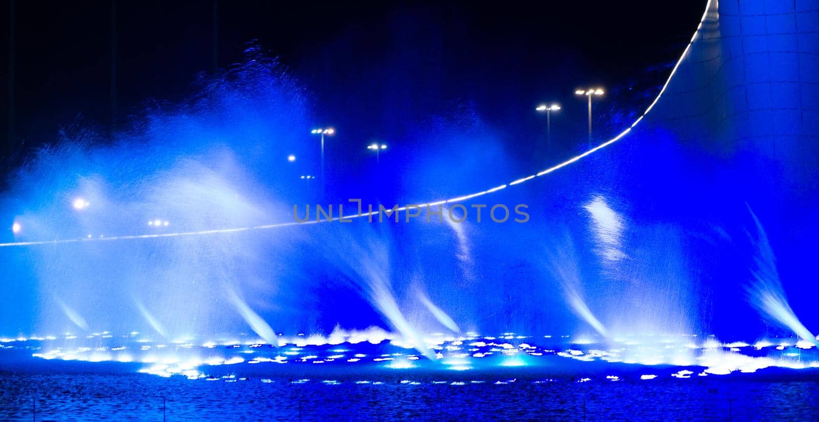 SOCHI, RUSSIA - JUNE, 05, 2021: The Waters of the Sochi Park, Water night show accompanied by classical music.