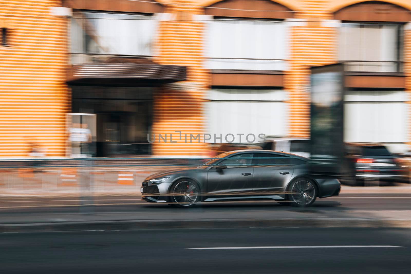 Ukraine, Kyiv - 16 July 2021: Silver Mercedes-Benz car moving on the street. Editorial by Yuriy_Vlasenko