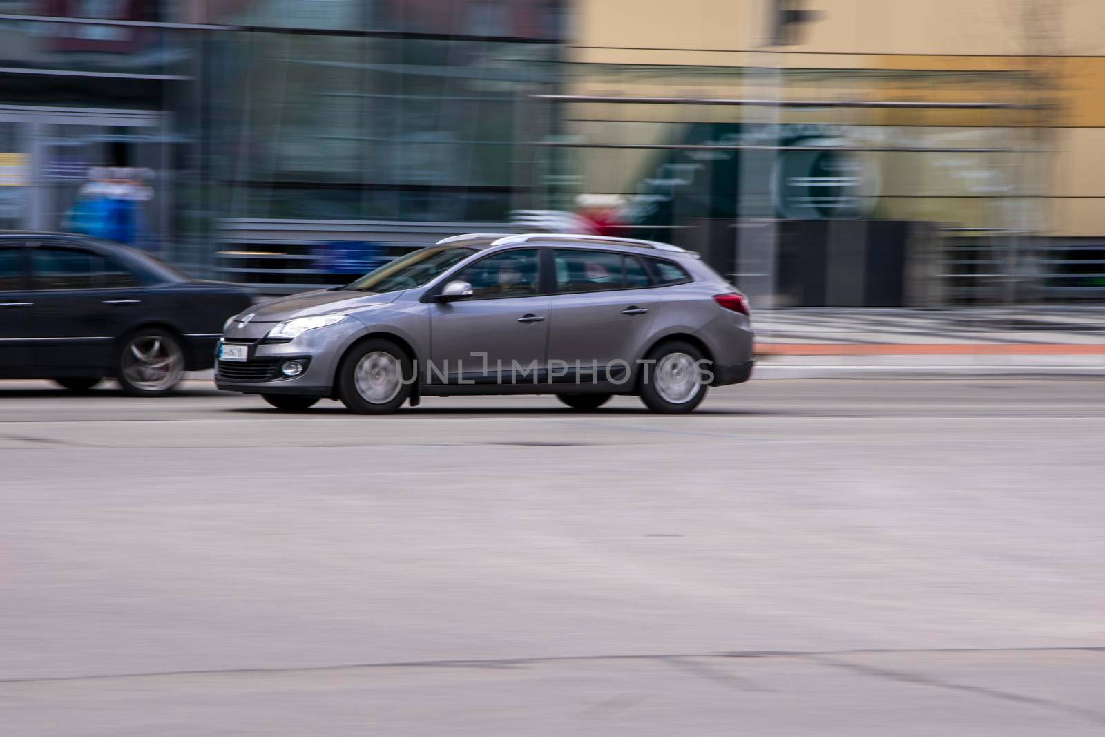 Ukraine, Kyiv - 26 April 2021: Silver Renault Megane car moving on the street. Editorial