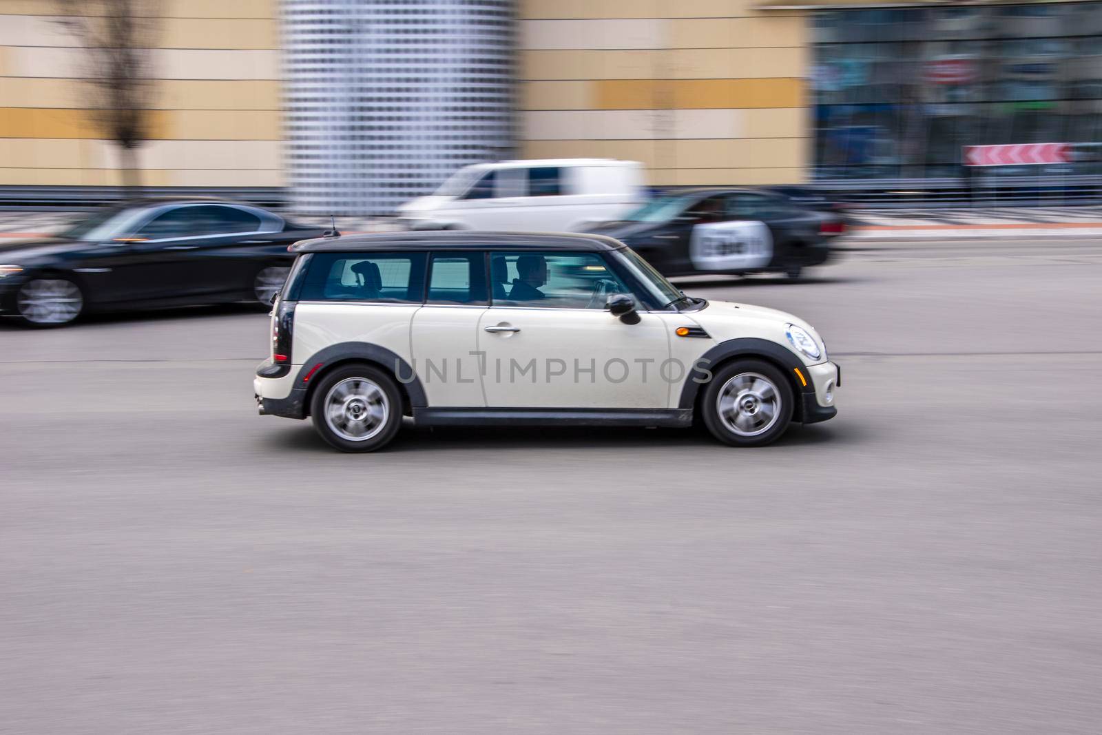 Ukraine, Kyiv - 26 April 2021: White MINI Clubman car moving on the street. Editorial