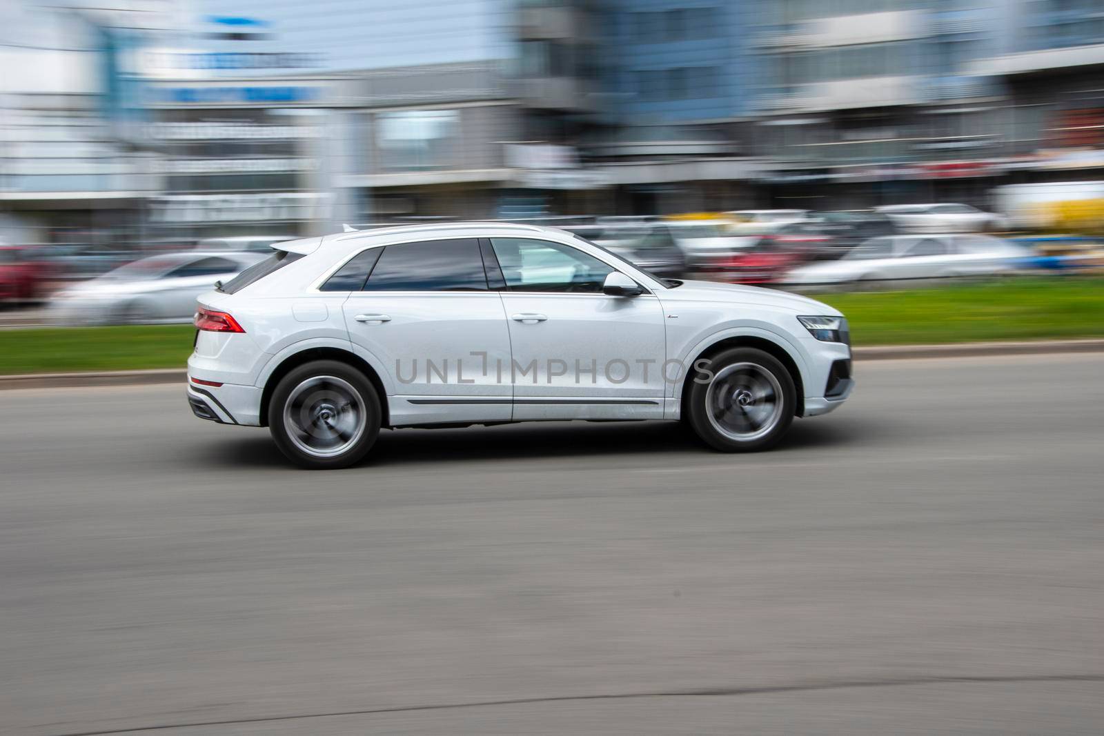 Ukraine, Kyiv - 26 April 2021: White Audi Q8 car moving on the street. Editorial