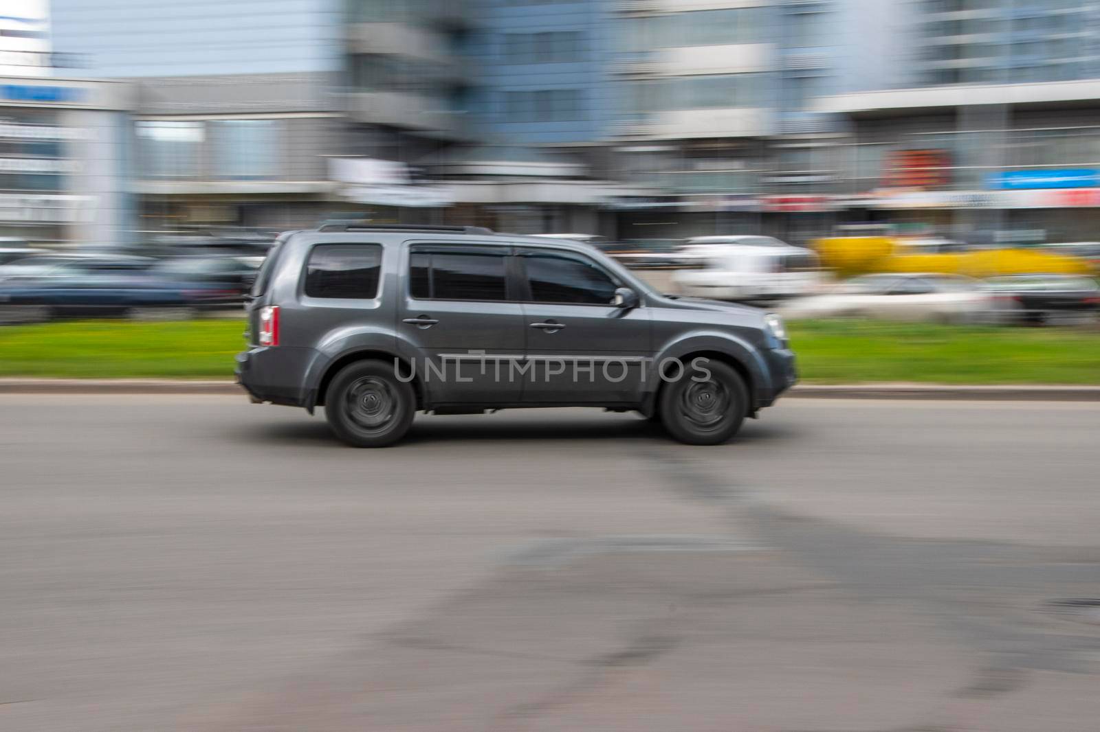 Ukraine, Kyiv - 26 April 2021: Gray Honda Pilot car moving on the street. Editorial