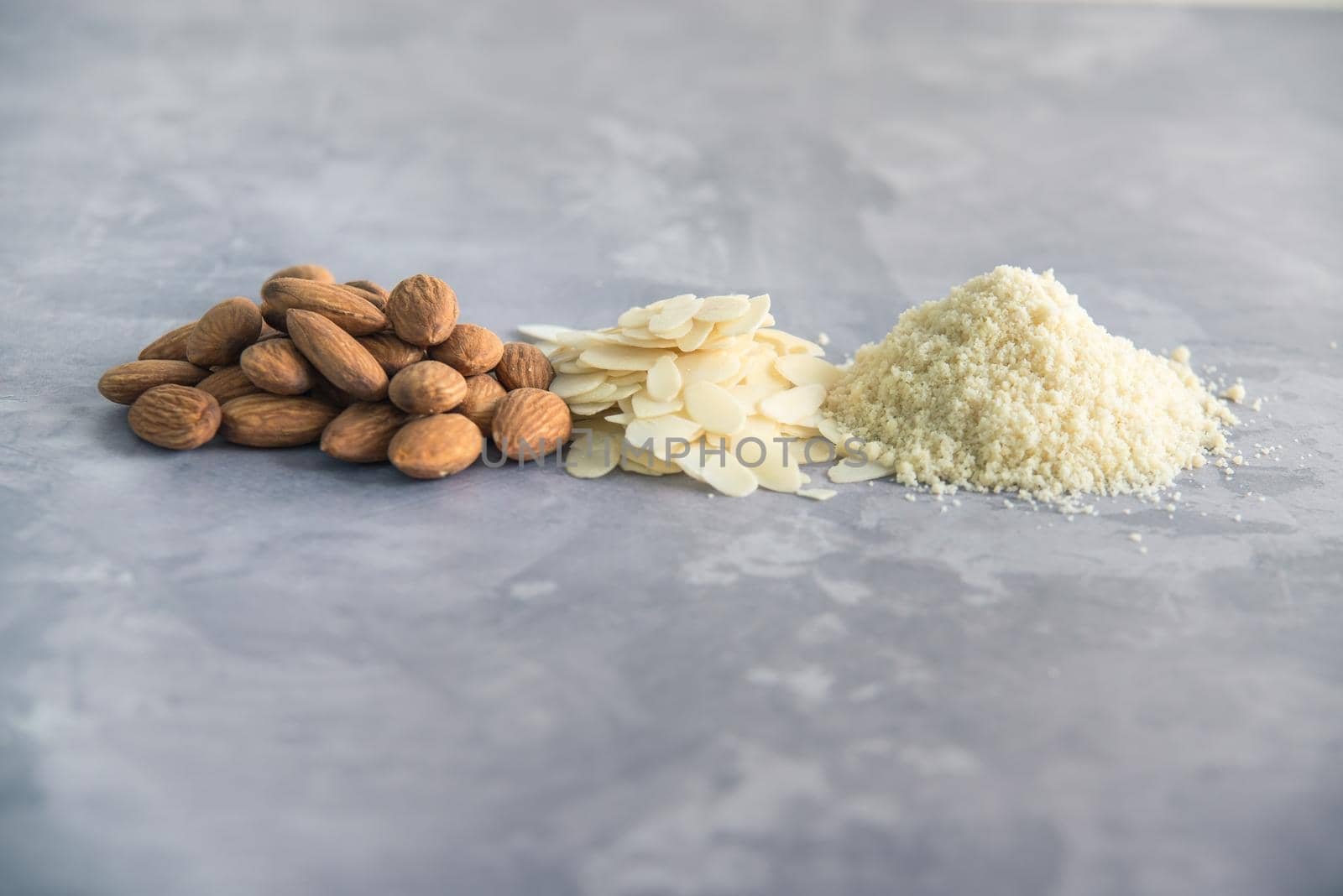 almonds, flakes and flour made from it. top view. High quality photo