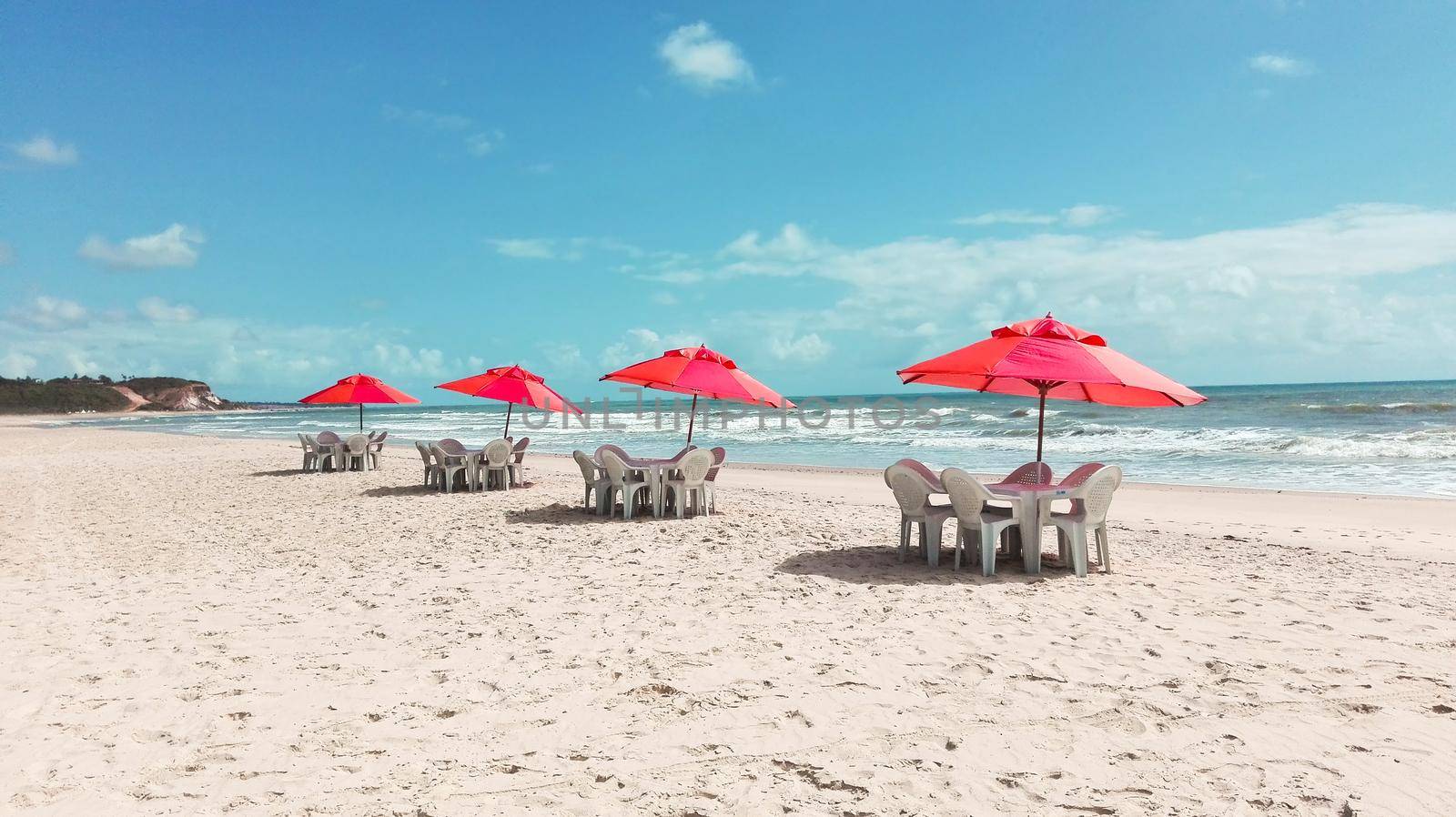 Beautiful scenery with beach and umbrellas, a fantastic place to spend your holidays.