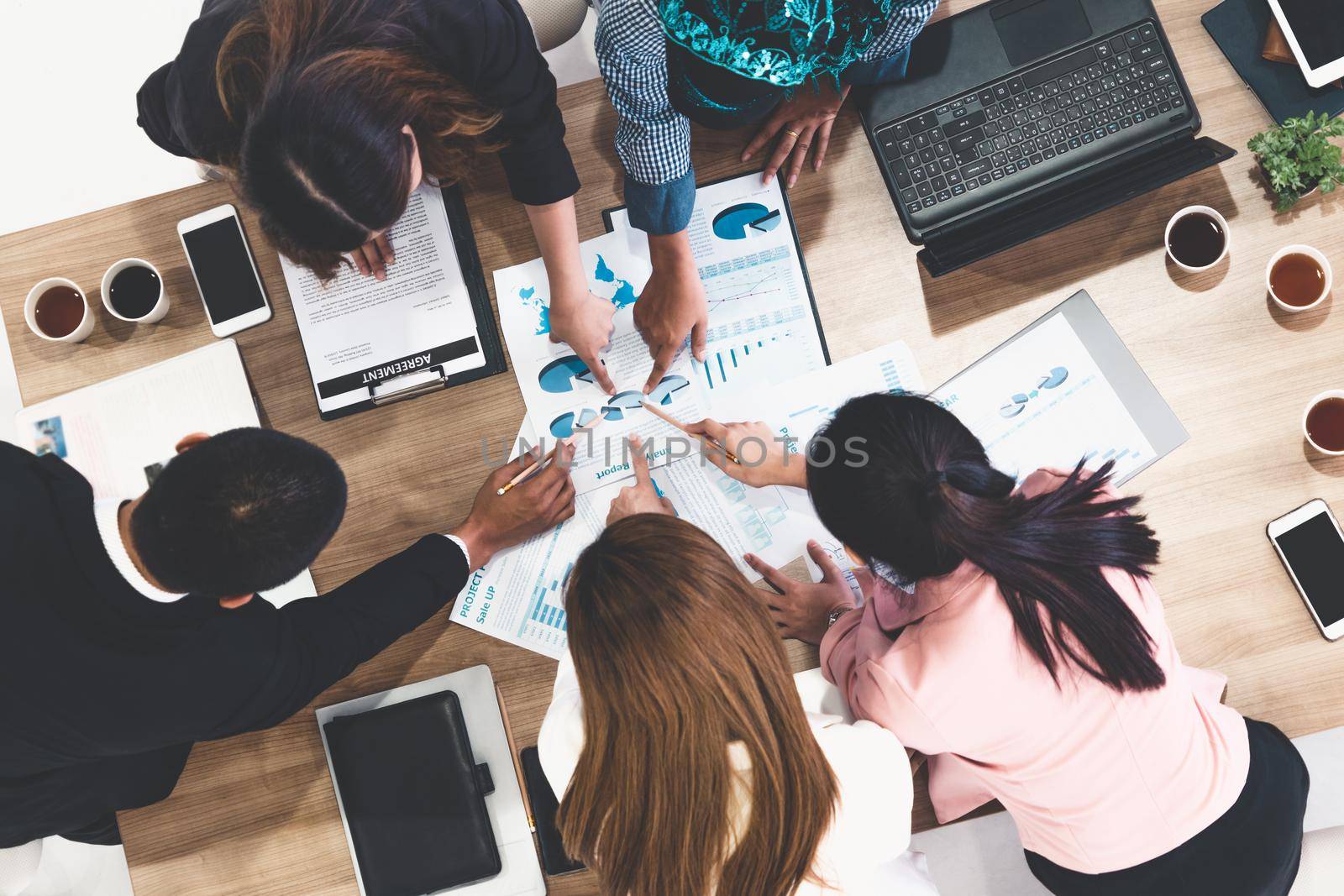 Business People in Group Meeting at Office Room. by biancoblue