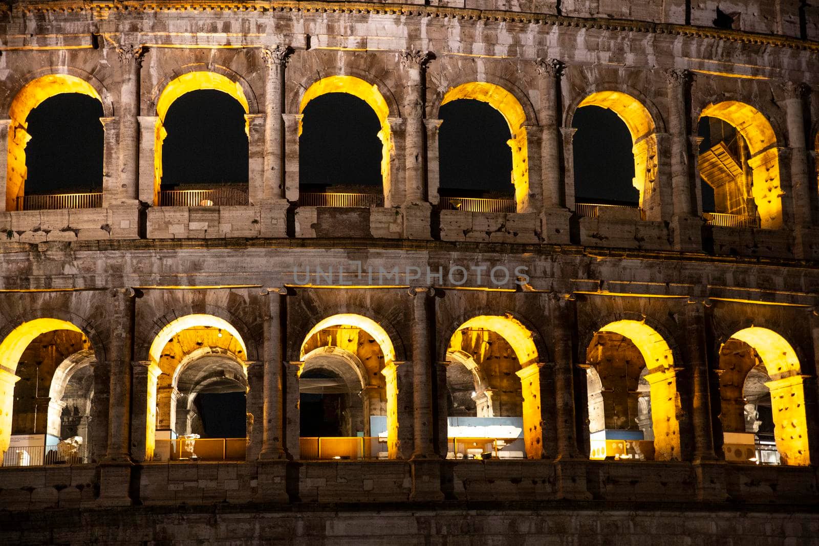 Roma, Italy, 24/11/2019: Night photo of the ancient Colosseum of Rome located in the city center, travel reports