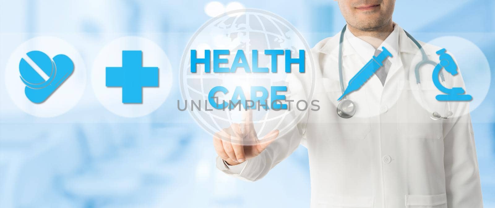 Medical Healthcare Concept - Doctor points at health icons showing symbol of medicine, medical cross and hospital lab research against blue abstract background.