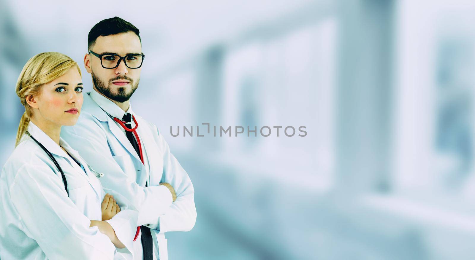 Doctor working with another doctor in the hospital. Healthcare and medical service.