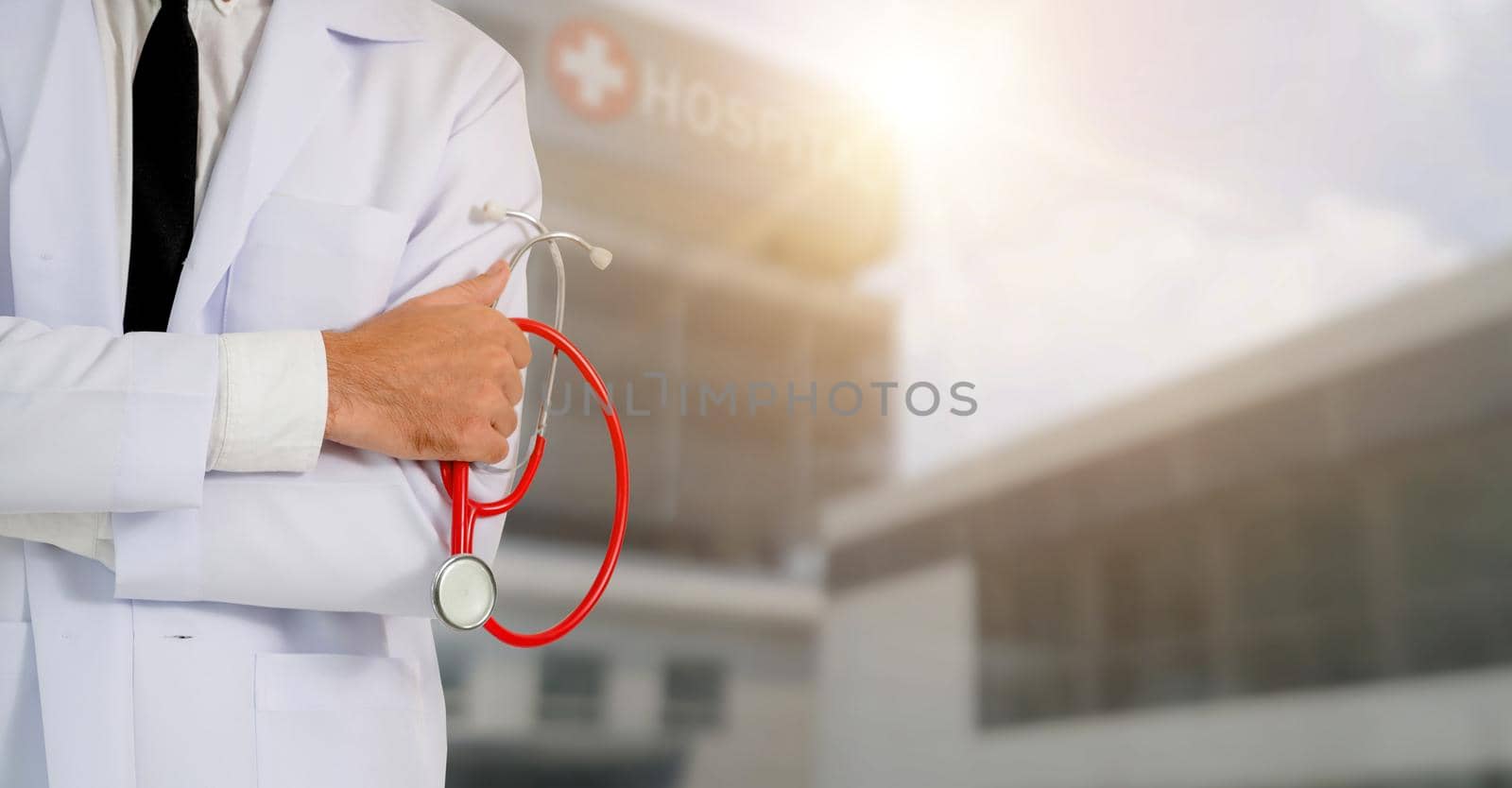 Young male doctor working at the hospital. Medical healthcare and doctor staff service.