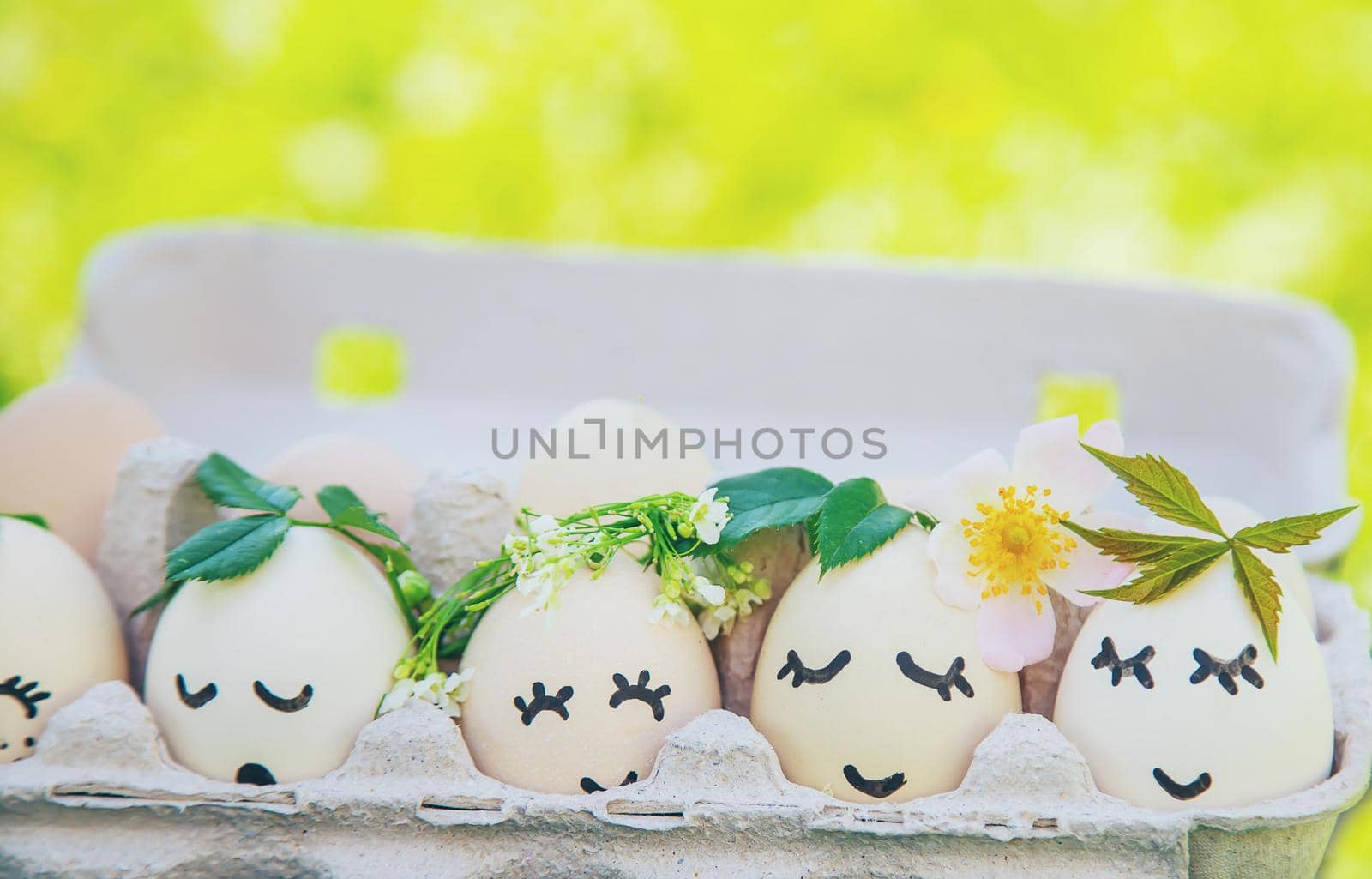 homemade eggs with beautiful faces and a smile. Selective focus. nature.