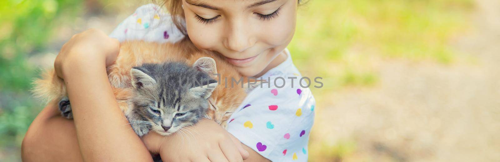 Little kittens in the hands of children. Selective focus. by yanadjana