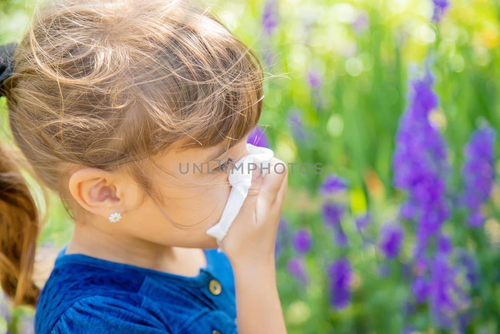 Seasonal allergy in a child. Coryza. Selective focus. by yanadjana