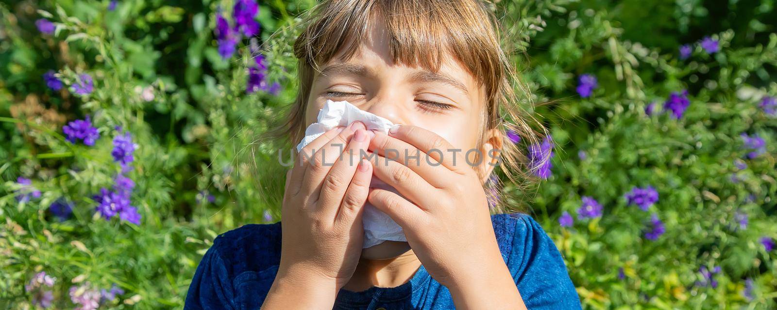 Seasonal allergy in a child. Coryza. Selective focus.