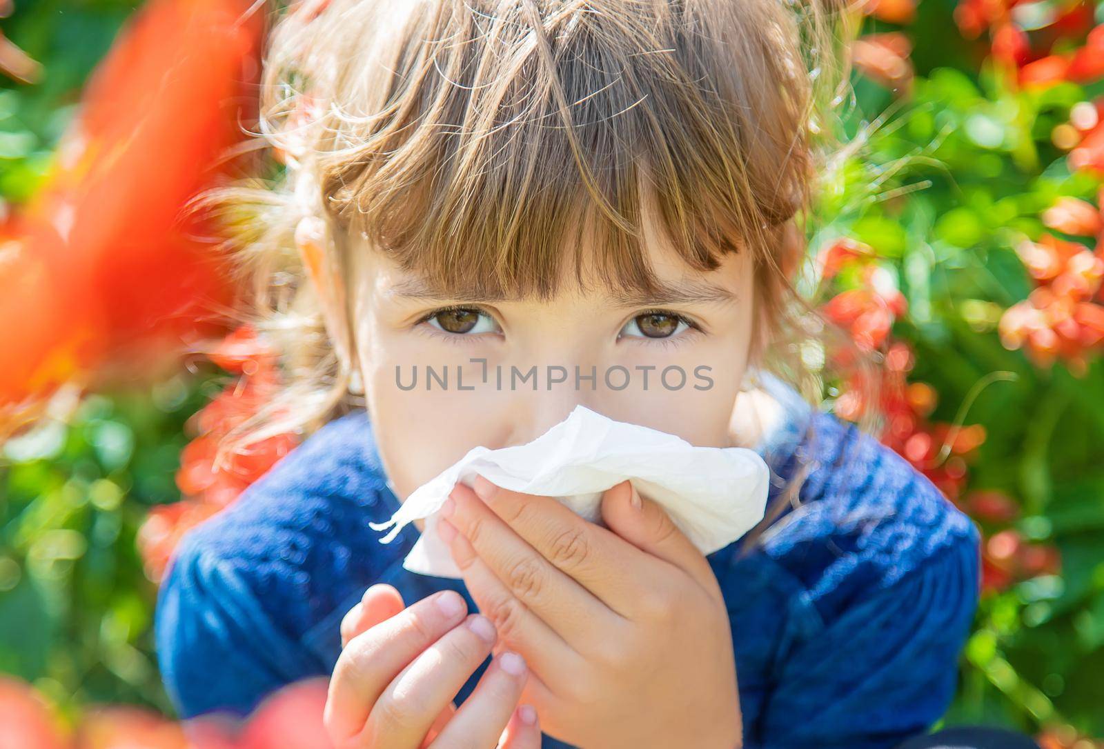 Seasonal allergy in a child. Coryza. Selective focus. by yanadjana