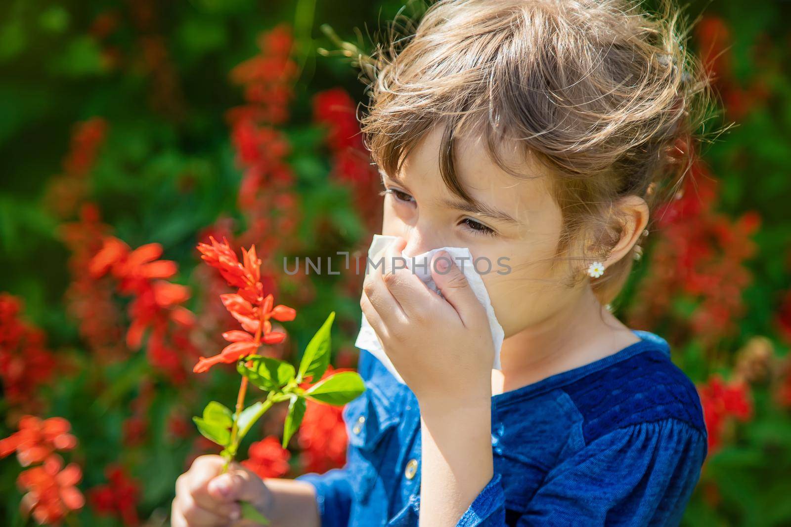 Seasonal allergy in a child. Coryza. Selective focus.