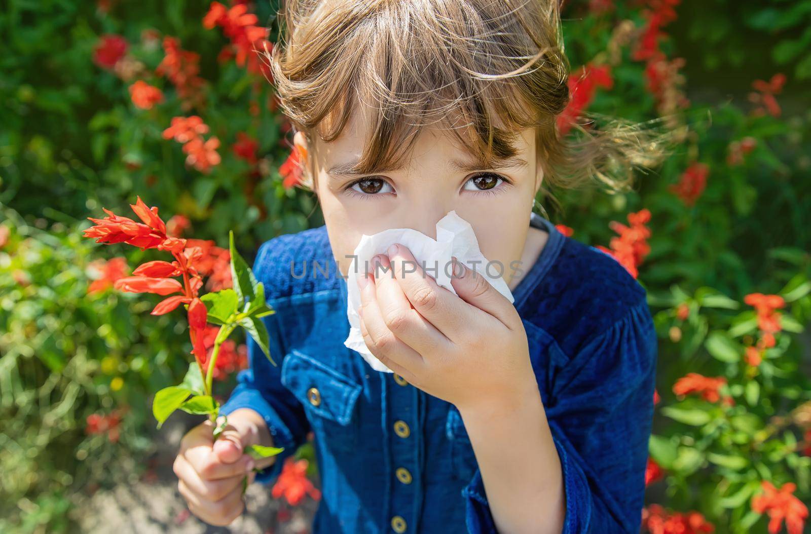 Seasonal allergy in a child. Coryza. Selective focus. by yanadjana