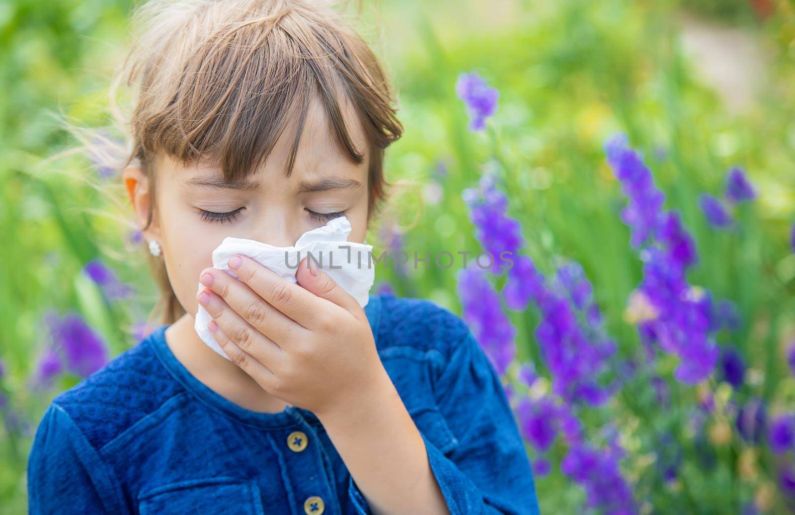 Seasonal allergy in a child. Coryza. Selective focus.