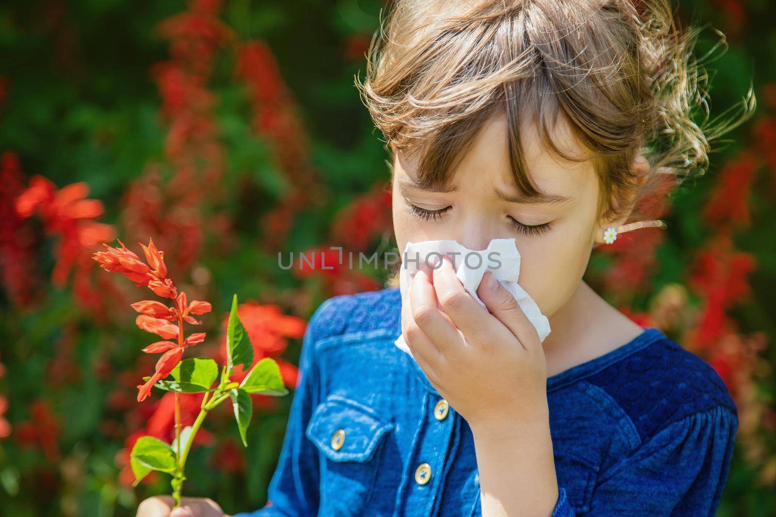 Seasonal allergy in a child. Coryza. Selective focus.