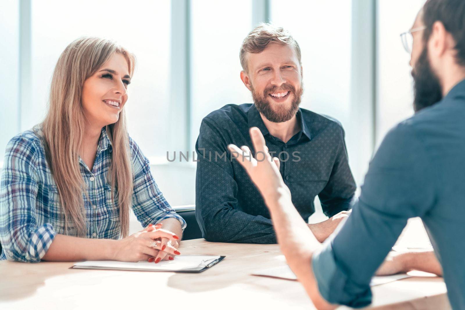 group of business people sitting at the office table. the concept of employment