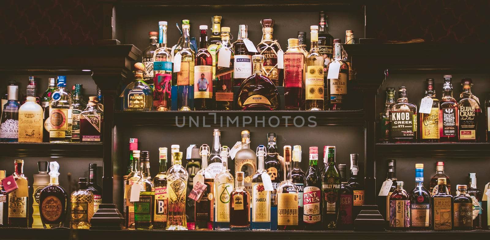 Imperia, Italy, 14/06/2018: high-quality spirits photographed from the front and exhibited in a distillery in the city of imperia in Liguria