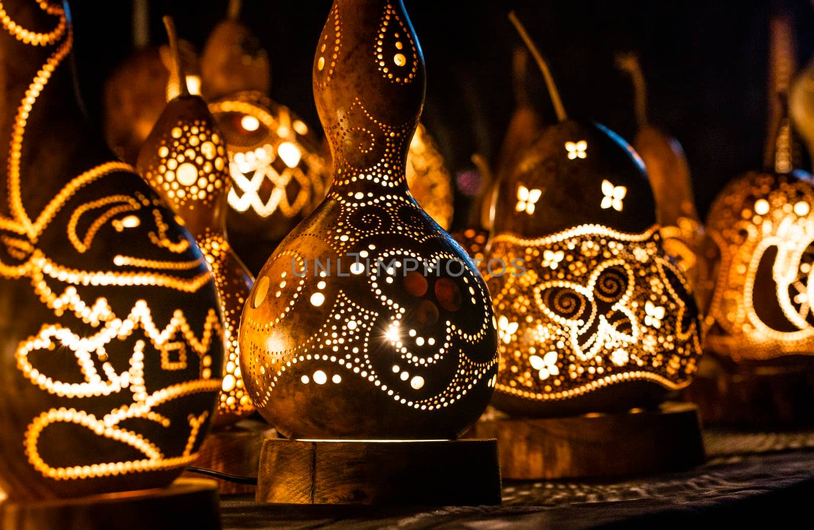 light lamp built with dried pumpkins and used as a design object