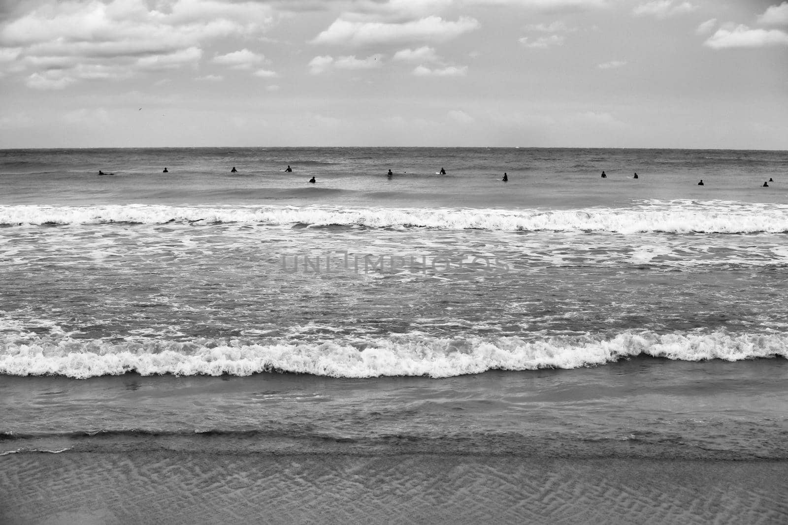 professional surfer in training in the sea of Liguria, sports reportage