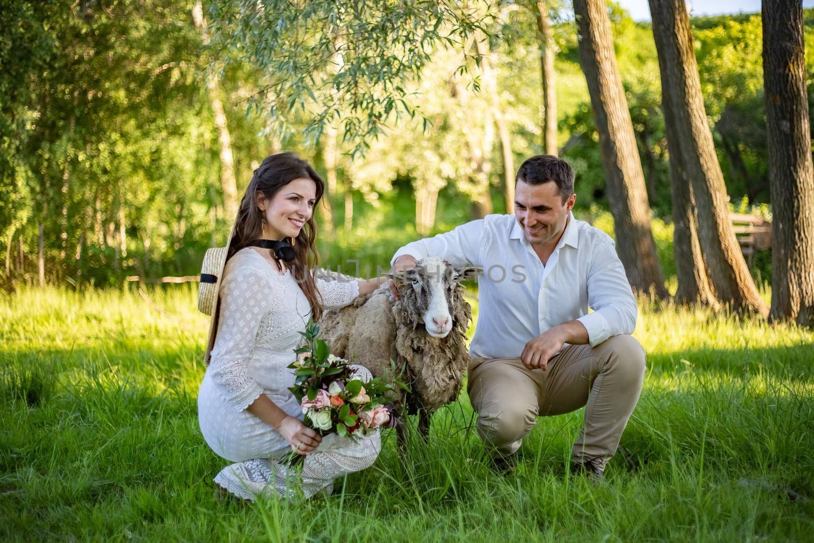 nice portrait of beautiful and young groom and bride outdoors