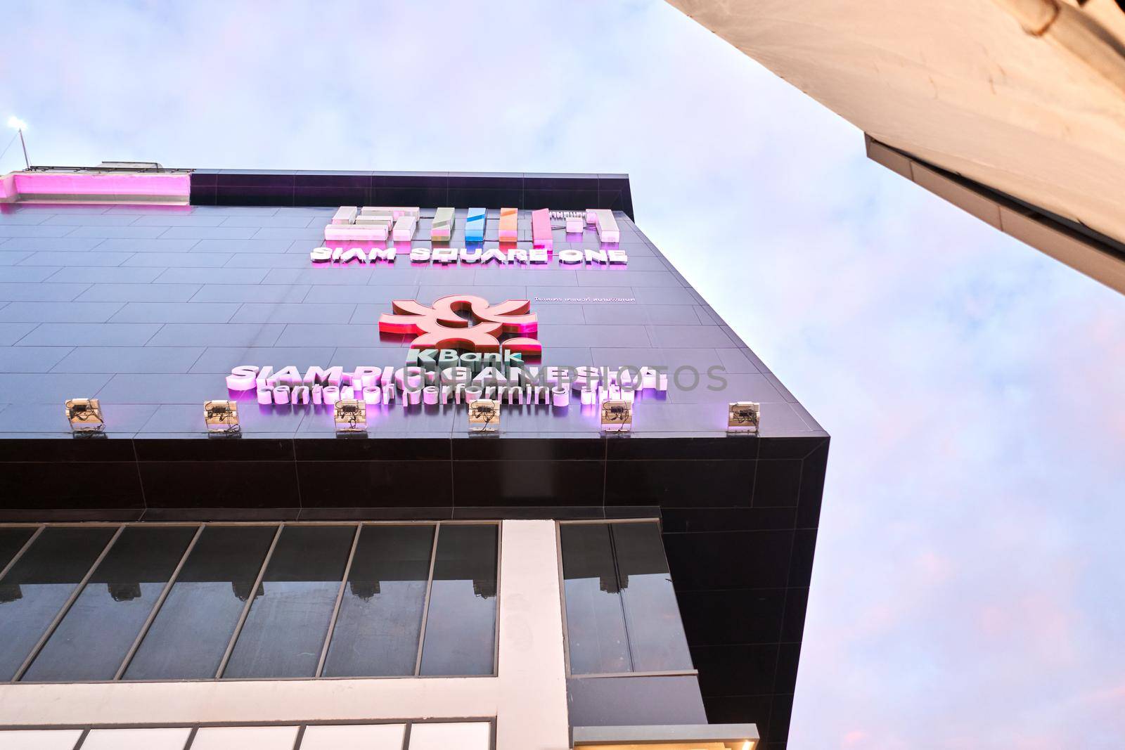 Facade of a modern bank building with logo and lettering with name in Bangkok, Thailand