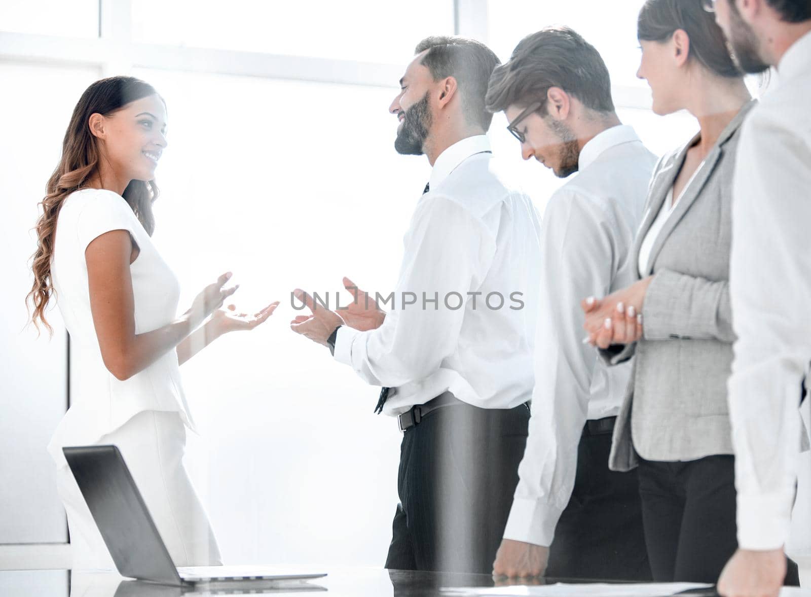 business team looks out the office window .photo with copy space