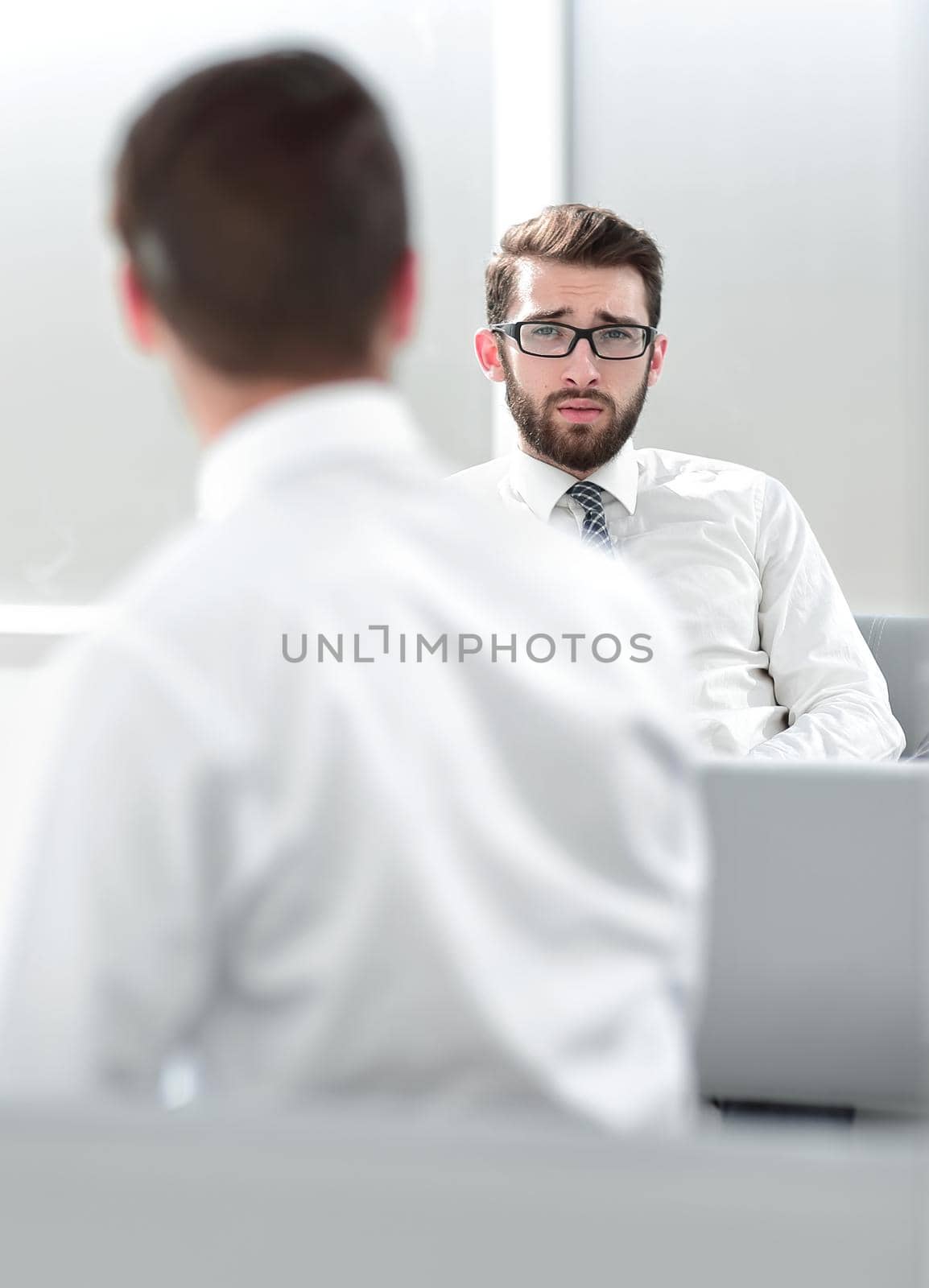 business background.business colleagues sitting in the office lobby .photo with copy space