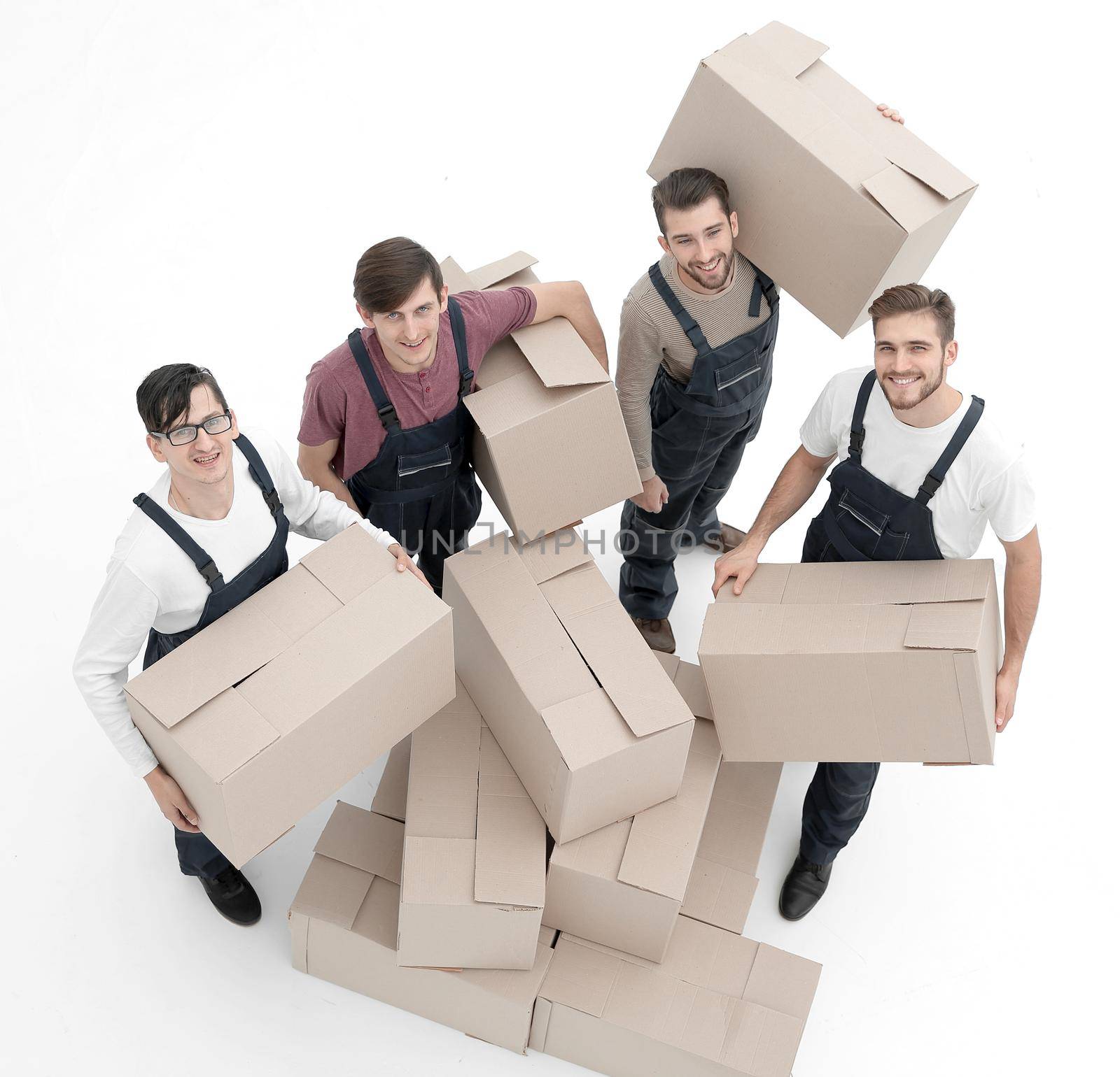 Young movers holding boxes isolated on white background,