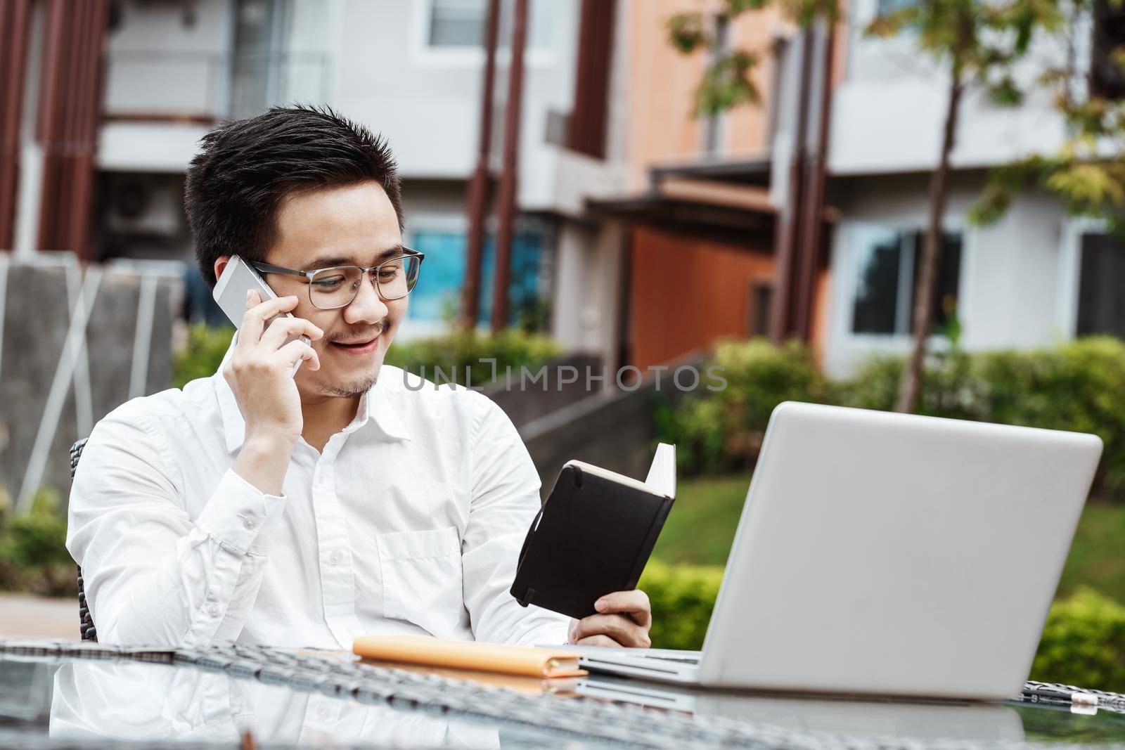 Business Concept - Young Business man woking on Financial plan. Strategy Analysis.