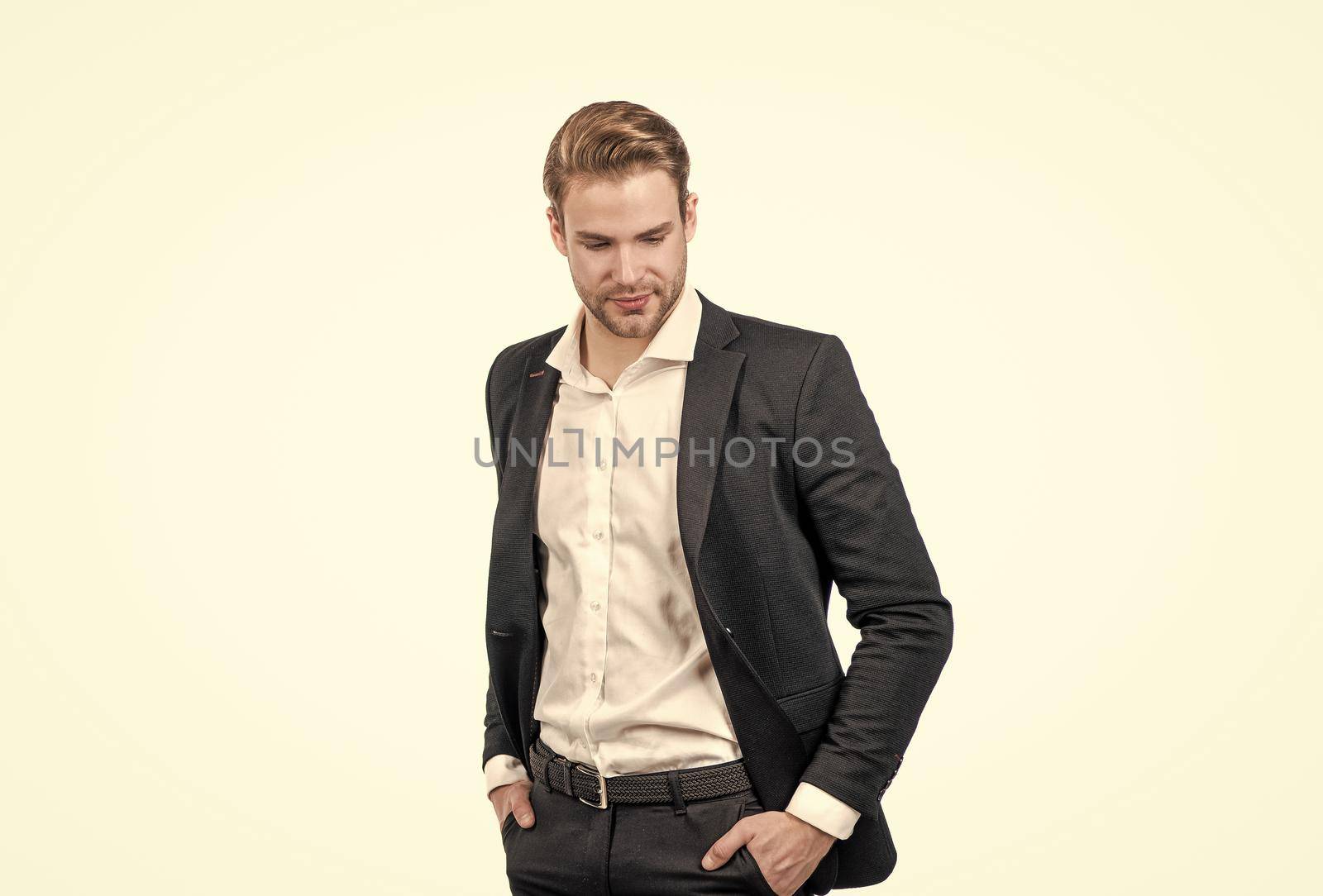 Serious professional business manager in formal suit isolated on white copy space, man.