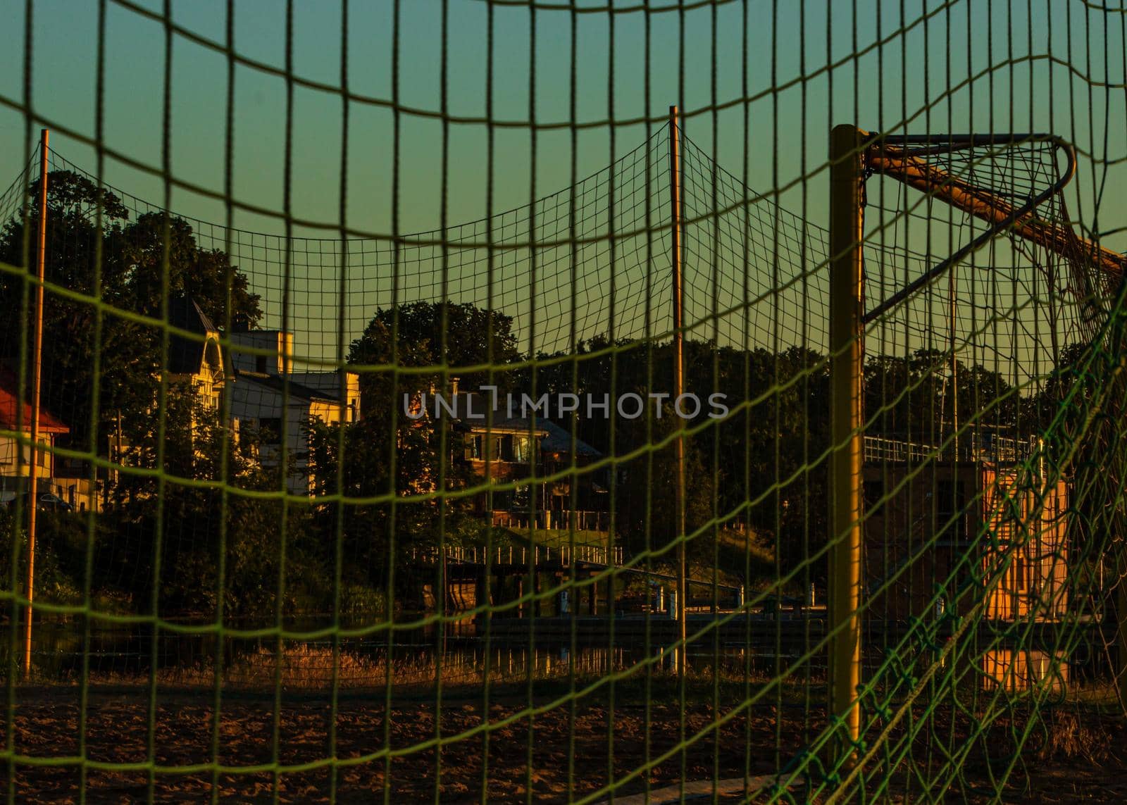 Fotball green net sunrise shine by scudrinja