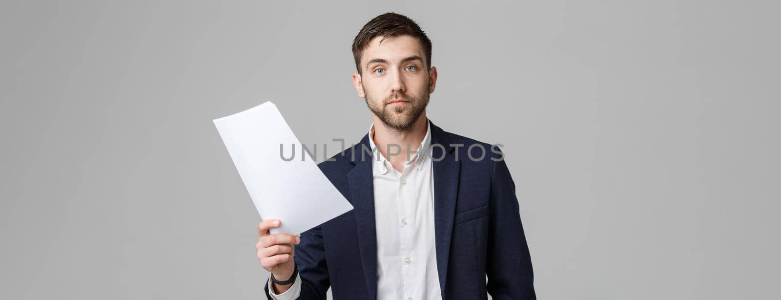 Business Concept - Portrait Handsome Business man serious working with annual report. isolated White Background. Copy space.
