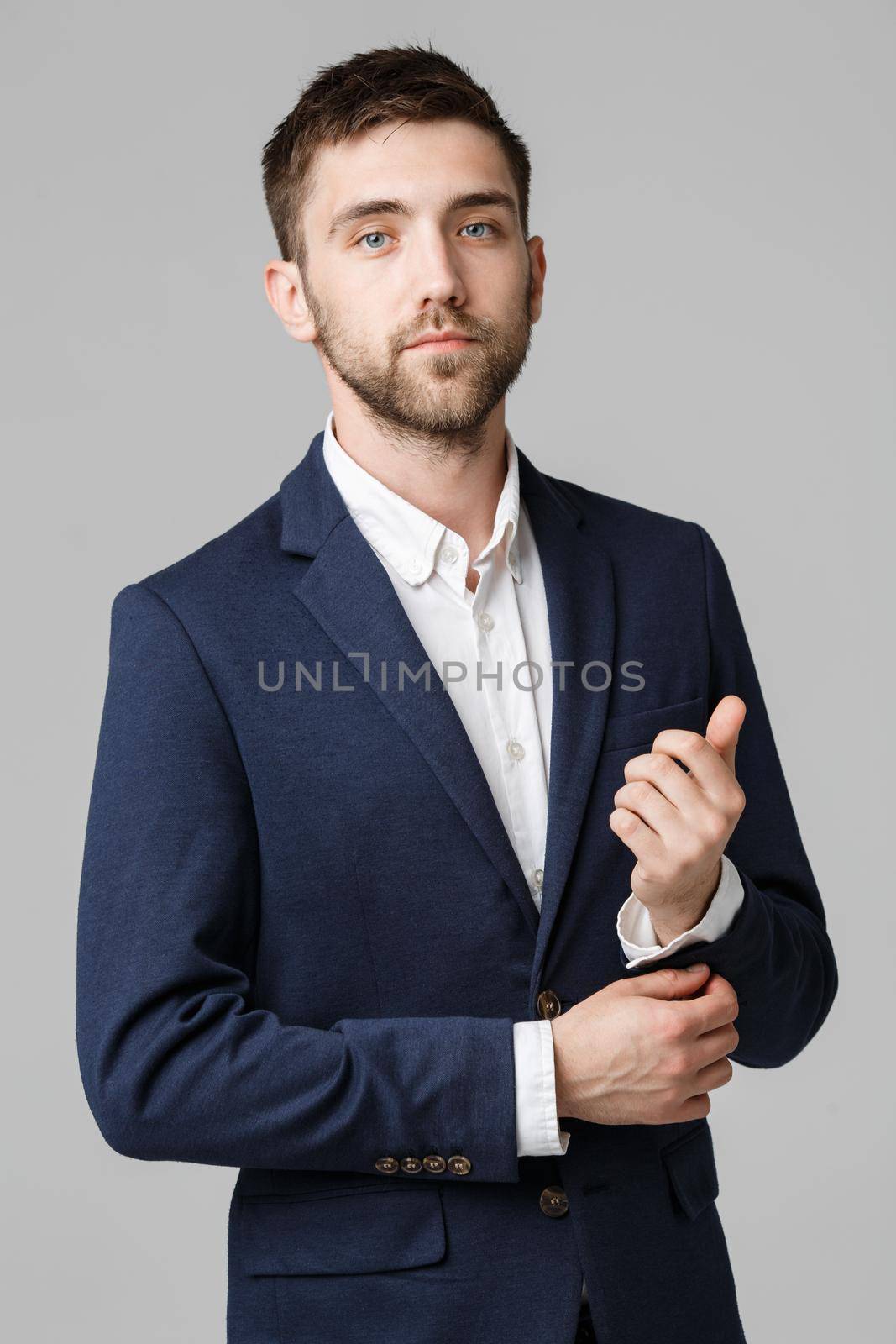 Business Concept - Portrait Handsome Business man prepare working suit with confident face. White Background.