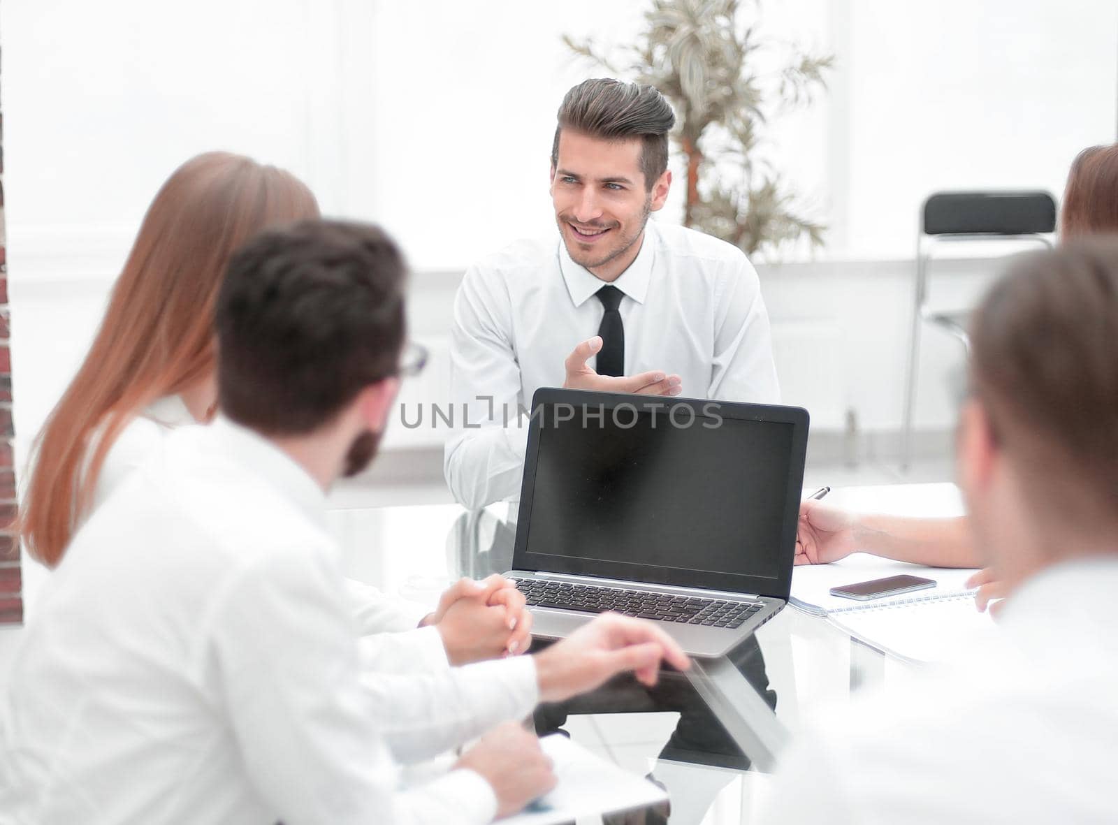 business team holds a meeting in a bright office.the concept of teamwork