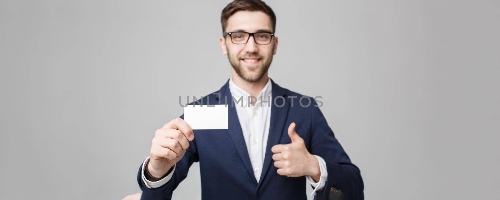 Business Concept - Portrait Handsome Business man showing name card with smiling confident face. White Background.Copy Space. by Benzoix