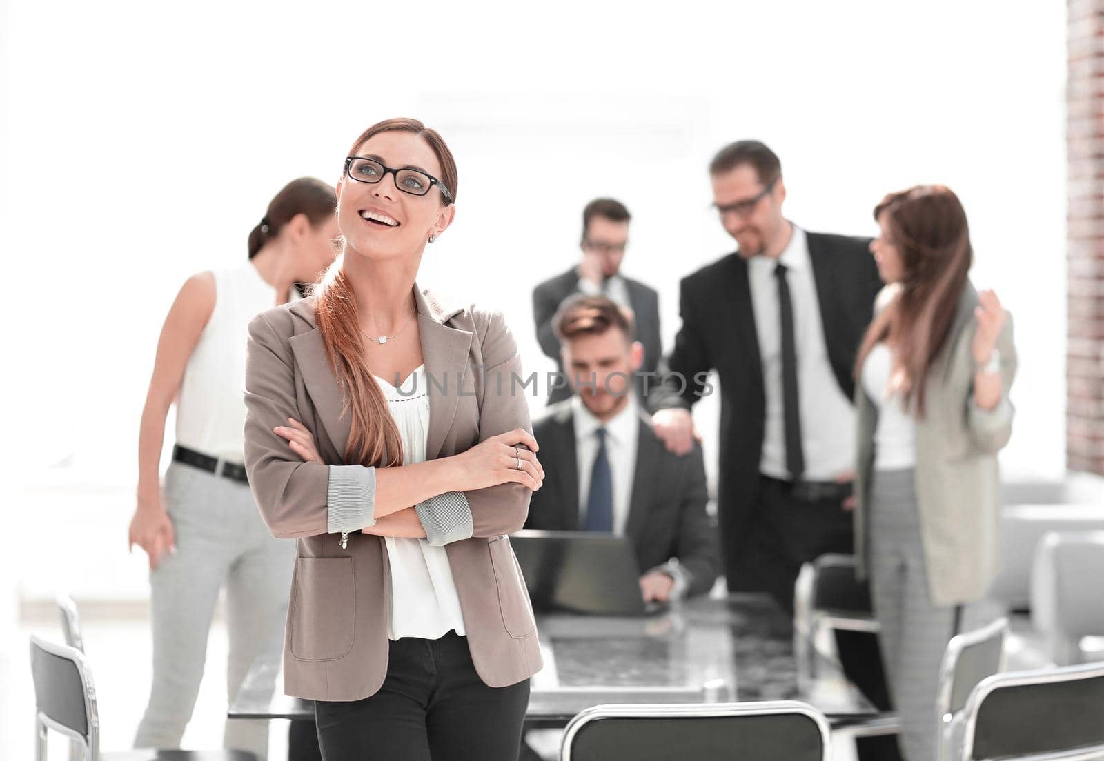 portrait of modern business woman on office background.photo with copy space