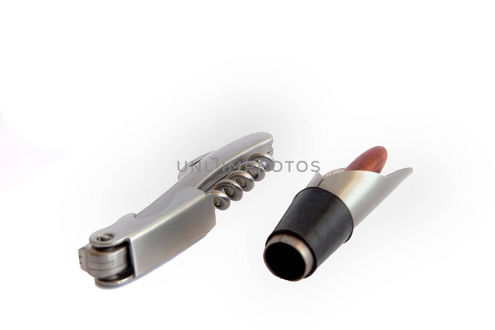 corkscrew and stopper for wine, isolated on white background