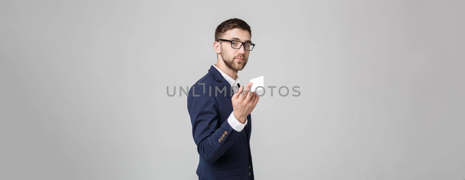 Business Concept - Portrait Handsome Business man showing name card with smiling confident face. White Background.Copy Space.