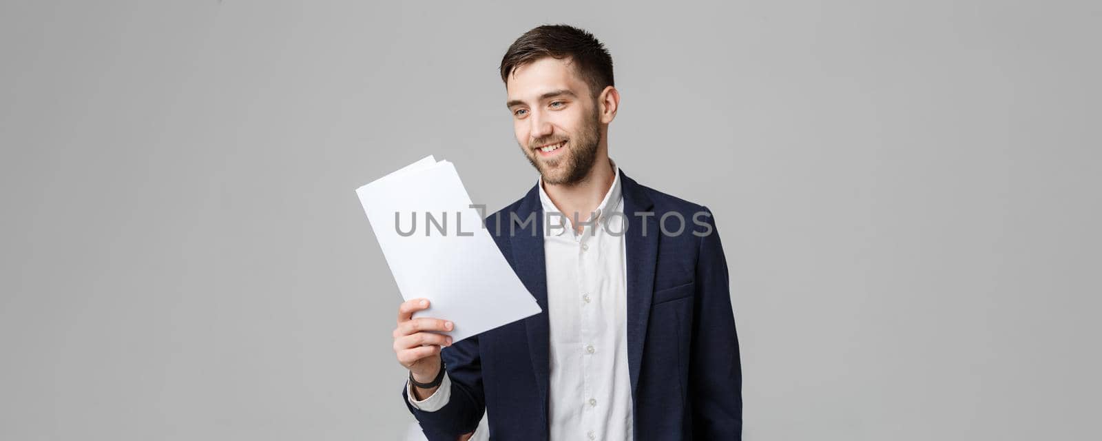Business Concept - Portrait Handsome Business man happy working with annual report. White Background. Copy Space.