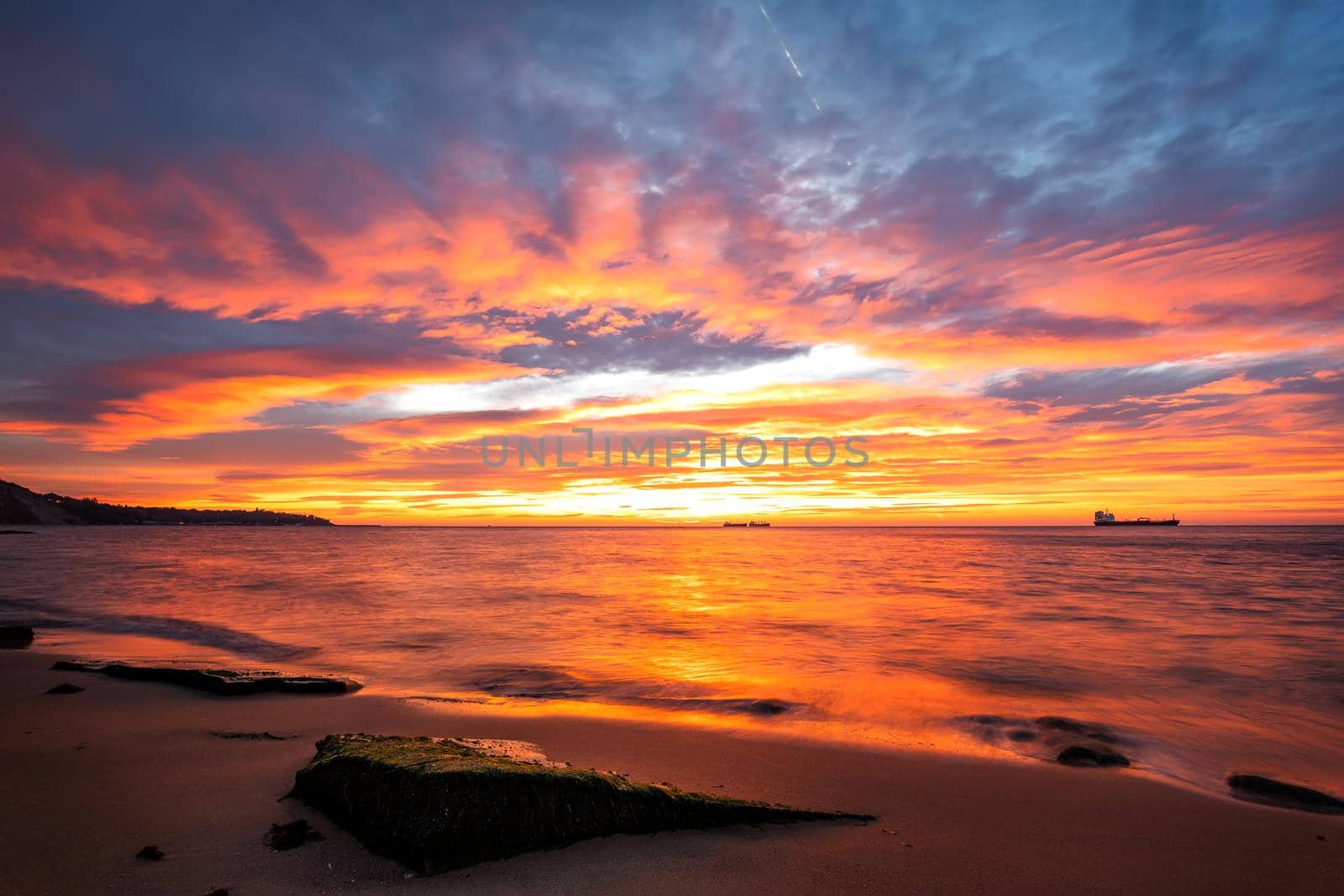 Amazing red sunrise over the sea.