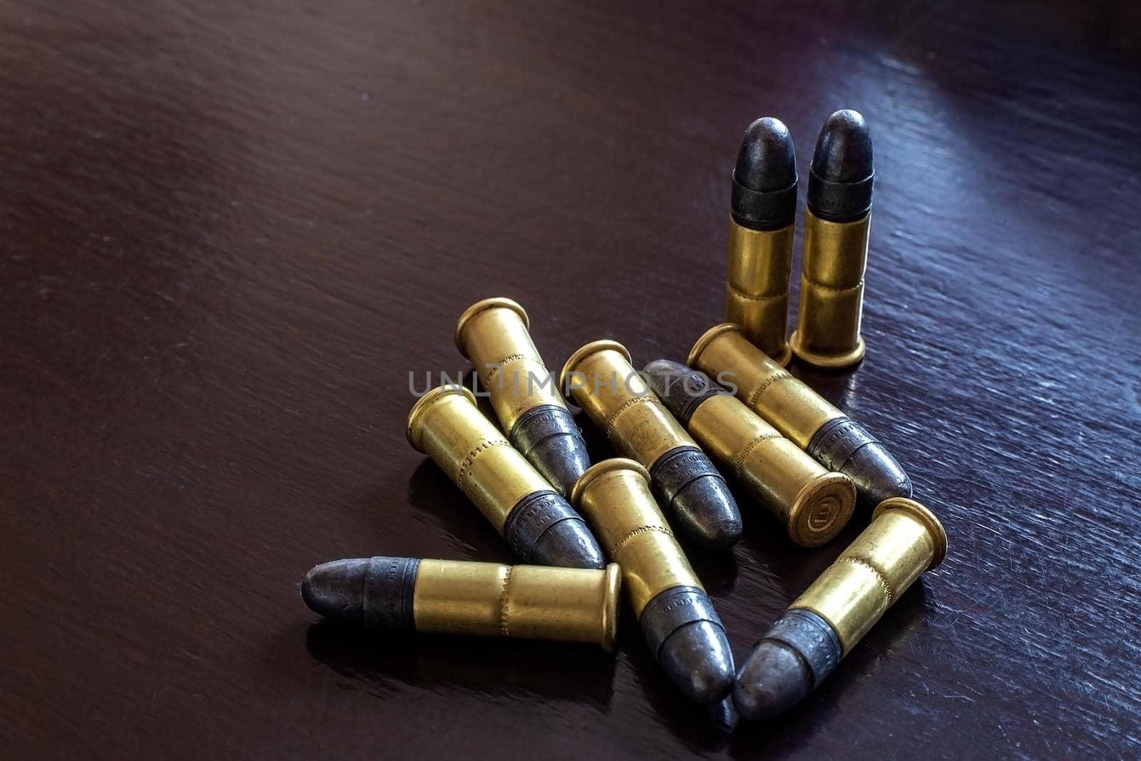 Bullets on the table. Ammunition. Concept of crime 