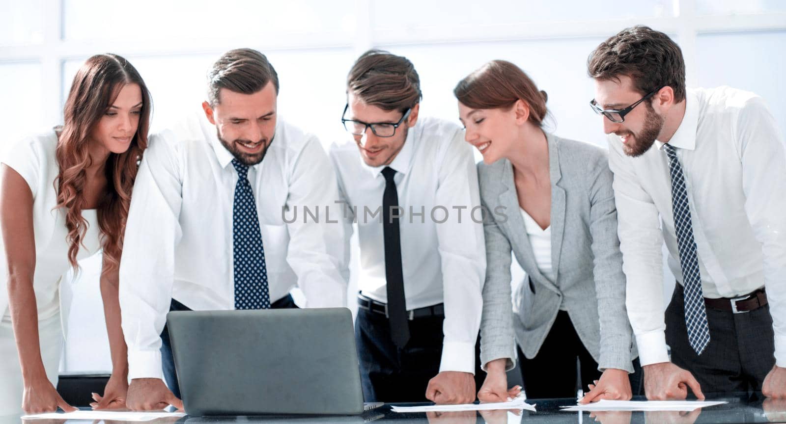 business team standing near the desktop.photo with copy space