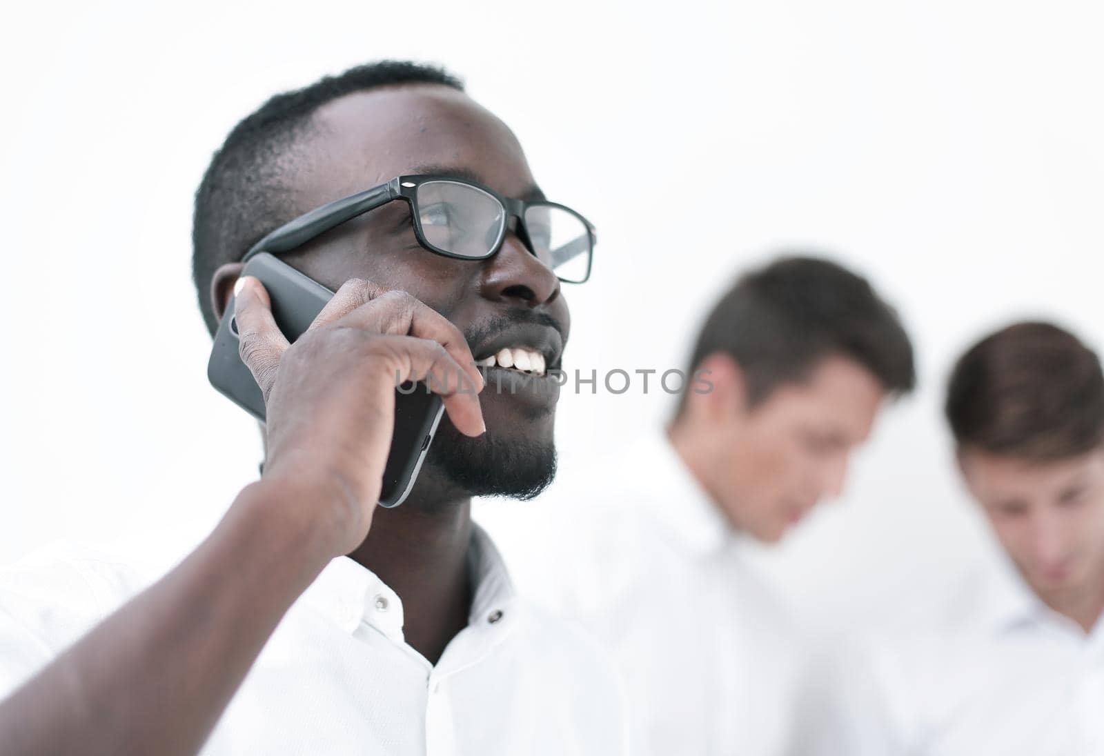close up.successful businessman talking on mobile phone.photo with copy space