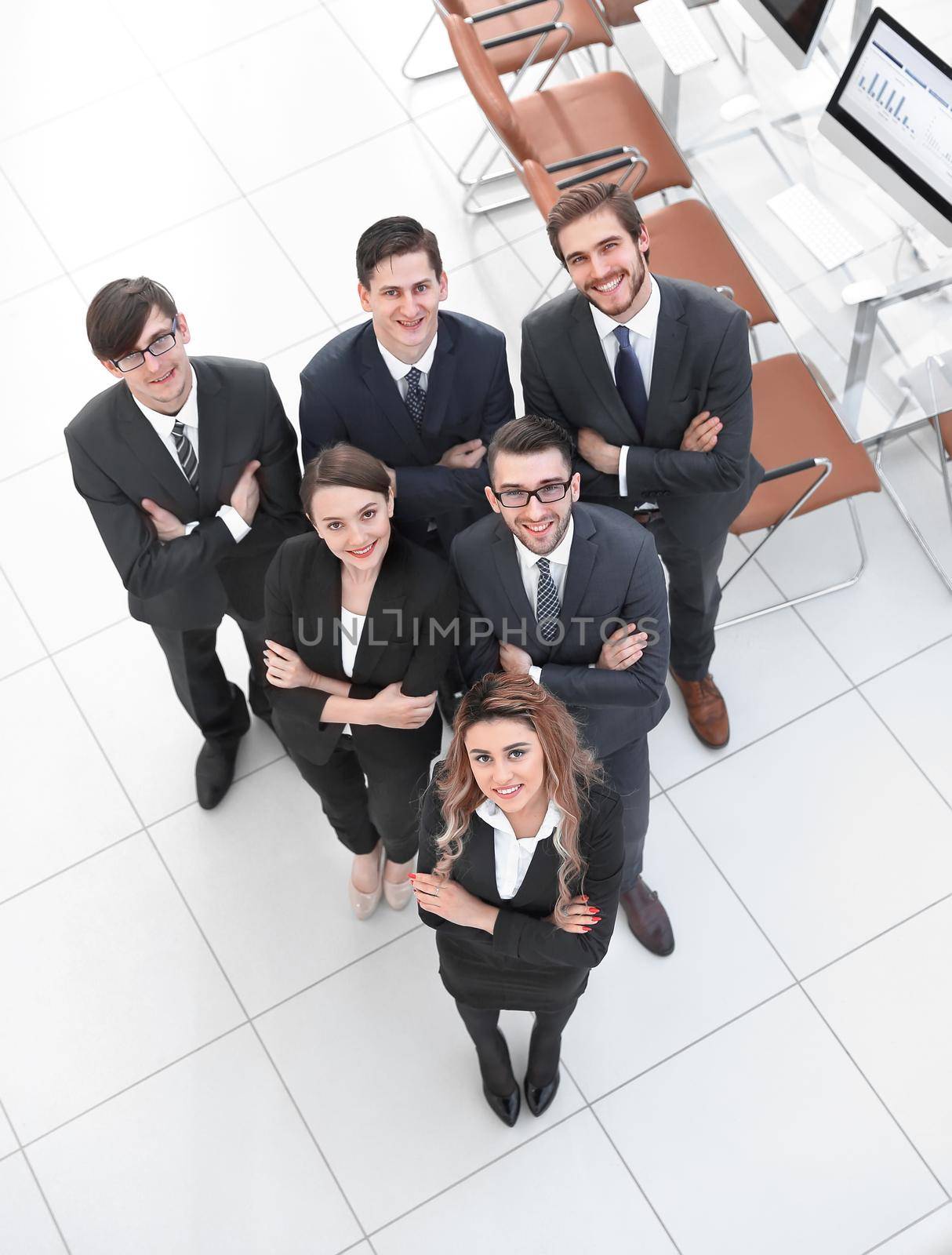 view from the top .business team standing in office.business concept