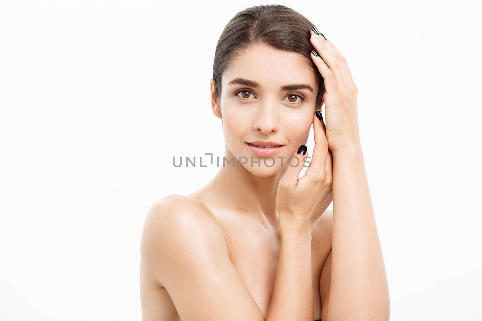 Beauty and spa concept - Charming young woman with perfect clear skin over white background